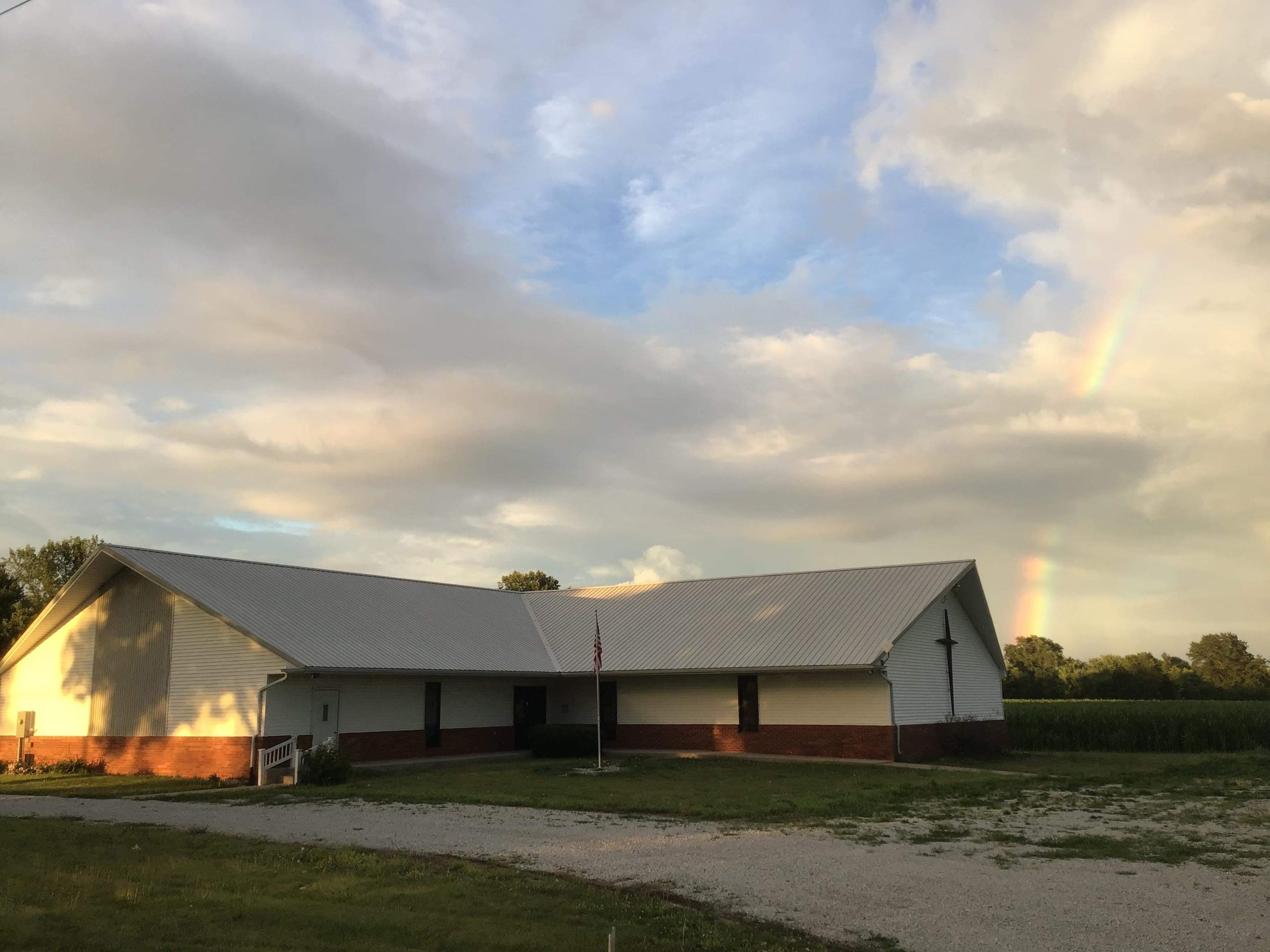 East Central Illinois Christian School building with a rainbow